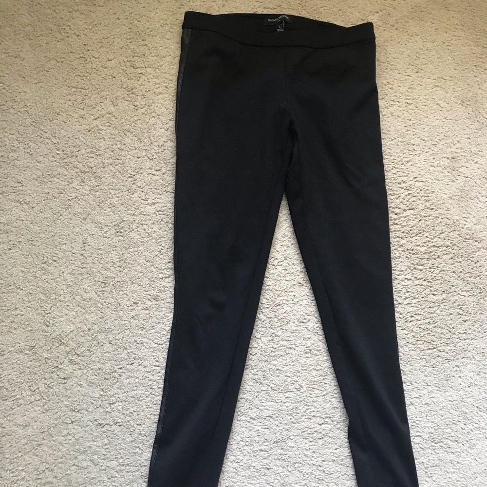 Black leather side pants.